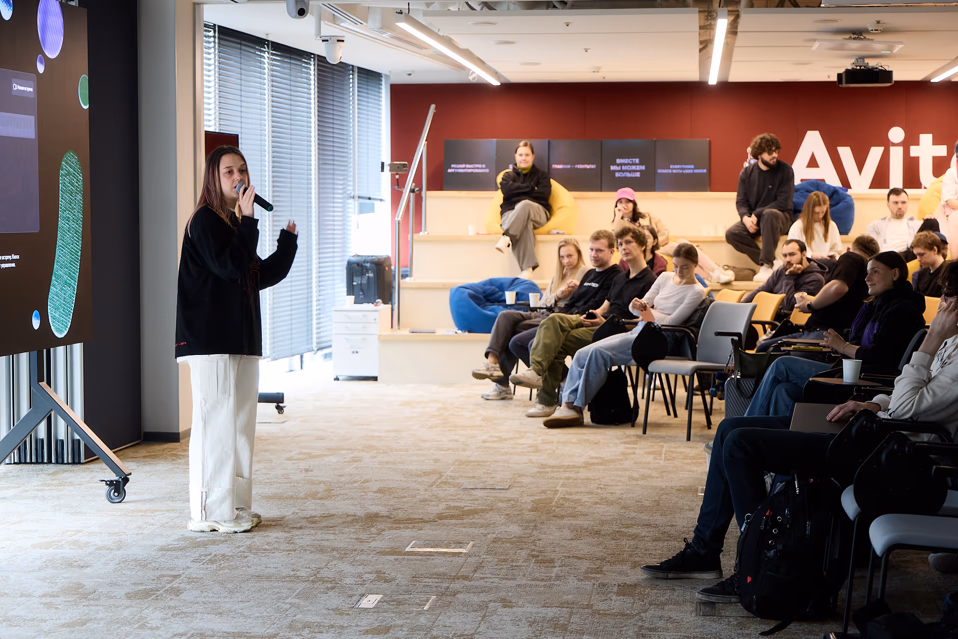Prodlyonka founder Sofia opening the Avito corporate team-building camp | Timestripe